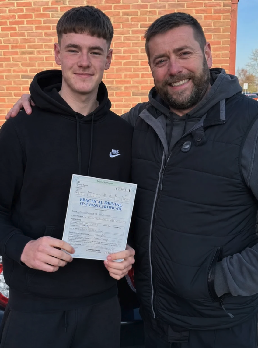 Mike & Callum celebrating their driving test pass